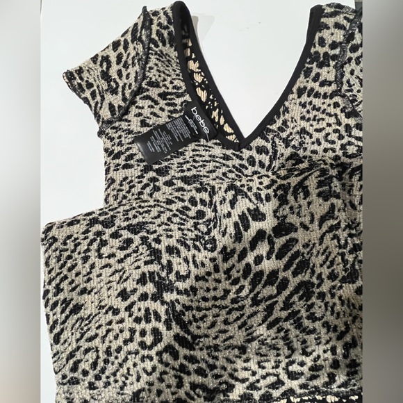 BEBE Stretch Nylon/Spandex w/Gold Metallic Accents Cap Sleeve “V”Neck Mini Dress - Picture 9 of 10